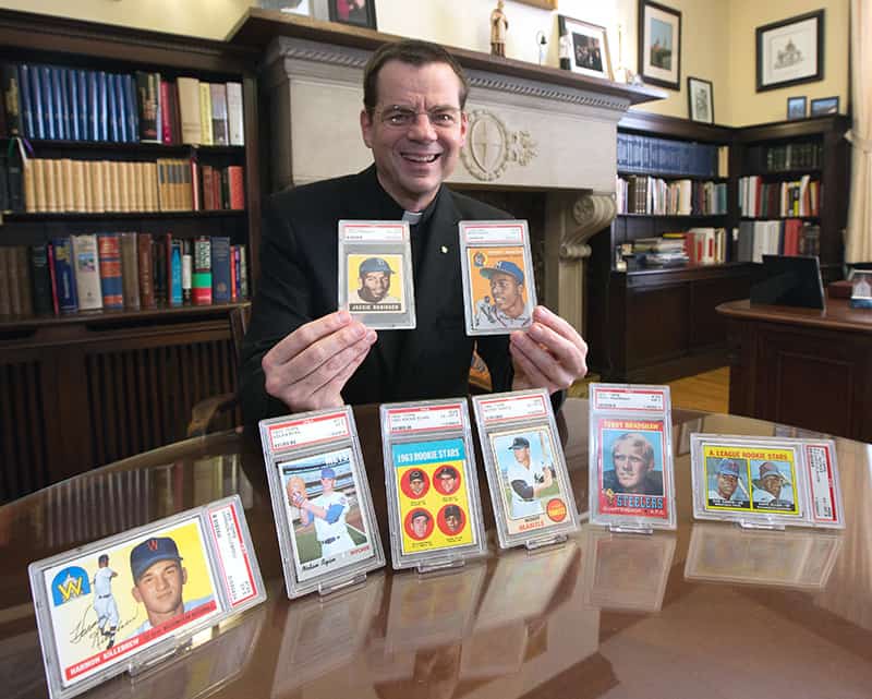 Read more about the article Minnesota priest plans to auction coveted baseball cards to aid low-income students
