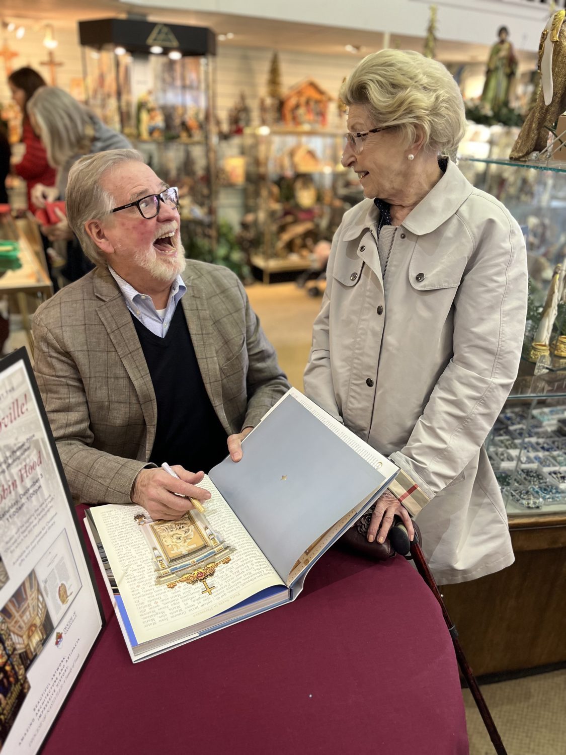 Read more about the article Photographer signs copies of pictorial history of the diocese