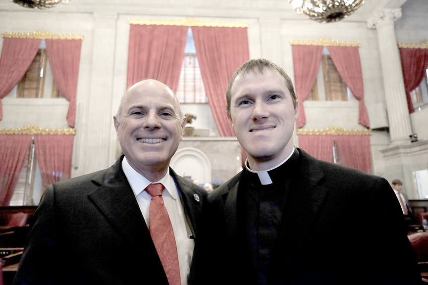 Read more about the article Priest leads prayer for Legislature as father is sworn in as representative